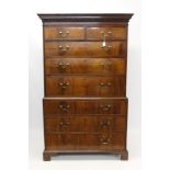 George III mahogany chest on chest with dentil cornice and two short over six graduated drawers on
