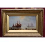 Nineteenth century English school oil on panel - marine scene with fishing boats at anchor and