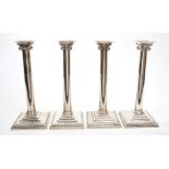 Fine quality set of four early George III silver candlestick with Ionic column and stepped bases