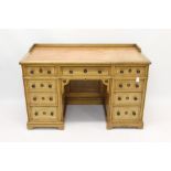 Victorian oak kneehole desk with gallery back and red tooled-leather writing surface,