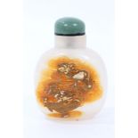 Chinese carved agate snuff bottle decorated with dragon with green jade stopper,