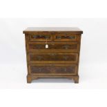 George I style walnut crossbanded and featherbanded bachelors chest,