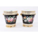 Pair mid-19th century French porcelain cache pots of circular taper form with gilt lions head