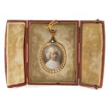 Fine quality early 20th century watercolour portrait miniature on ivory of a child named verso as