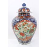 Late 19th century Japanese Imari baluster vase and cover with polychrome enamel bird and shi shi