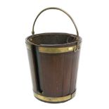 Large George III mahogany and brass bound plate bucket of coopered form,
