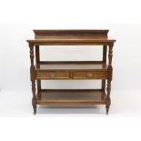 Edwardian mahogany buffet with reeded, boss carved gallery back and three rectangular tiers,