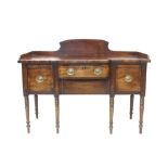 Regency mahogany and ebony line-inlaid bowed breakfront sideboard with three-quarter gallery and