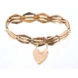 Early 20th Century rose gold gate bracelet with padlock clasp dated 1912 CONDITION REPORT