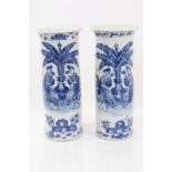Pair of 19th century Chinese export blue and white cylinder vases with painted figure and insect