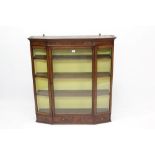 George III mahogany hanging wall cabinet with central glazed door enclosing shelves and canted