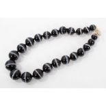Banded agate bead necklace with a string of graduated banded agate beads measuring approximately 18.