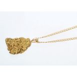 Gold nugget pendant on 14ct gold chain CONDITION REPORT nugget pendant is stamped