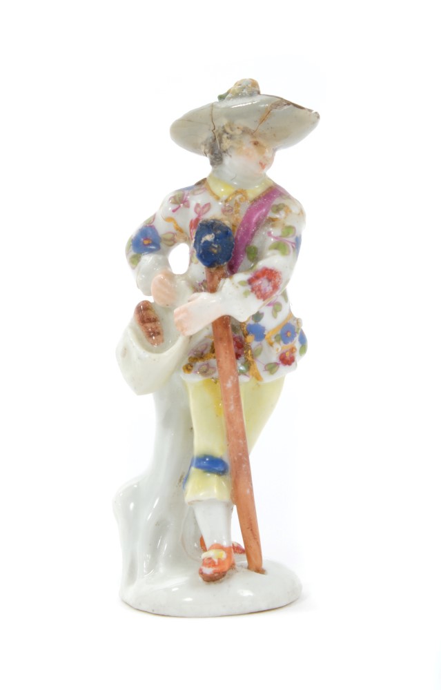 18th century Meissen miniature figure of a gentleman with club and gamebag,