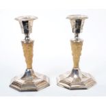 Pair Victorian silver candlesticks of tapering form with classically carved ivory stems and faceted