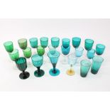 Collection of twenty-two 19th century Bristol green wine glasses,