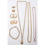 Group of gold and yellow metal jewellery - to include pendants, earrings,