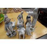 Five Lladro porcelain figures - including girl with doll in rocking chair, ladies with geese, etc,