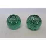 Pair of Victorian Sutherland green glass ink pots,