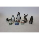 Collection of Royal Copenhagen figures including frog, mouse, bird, penguin,