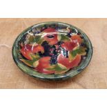 Moorcroft Pomegranate pattern circular dish on green ground - green signature and impressed marks