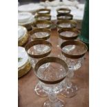 Good quality glass table service with gilt rims