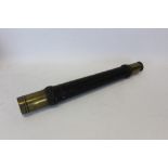 Victorian lacquered brass scope with woven canvas covered body, by T. L.