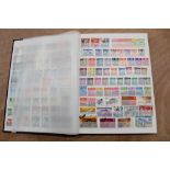 Stamps - stockbook of China and Hong Kong - including QEII high values - mint and used - all