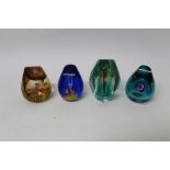 Four Caithness limited edition glass paperweights - Space Hibiscus 1998, by Helen Macdonald, no.