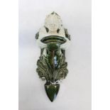 Late 19th century Limoges pottery fairy wall bracket with green and cream glaze