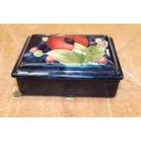 Moorcroft open Pomegranate pattern box and cover of rectangular form,