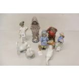 Four Nao porcelain figures,