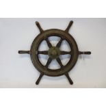 Oak and brass ships' wheel of conventional form,