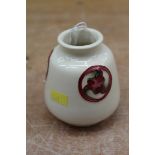 Moorcroft small vase with red floral roundel decoration on cream ground,