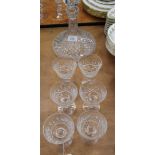 Six Waterford Crystal Lismore pattern champagne glasses and a matching decanter CONDITION