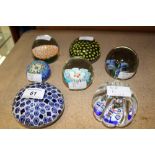 Seven Murano glass paperweights - including four with millefiori decoration