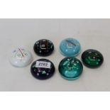 Six Caithness 'Noughts & Crosses 2000' paperweights by Colin Terris