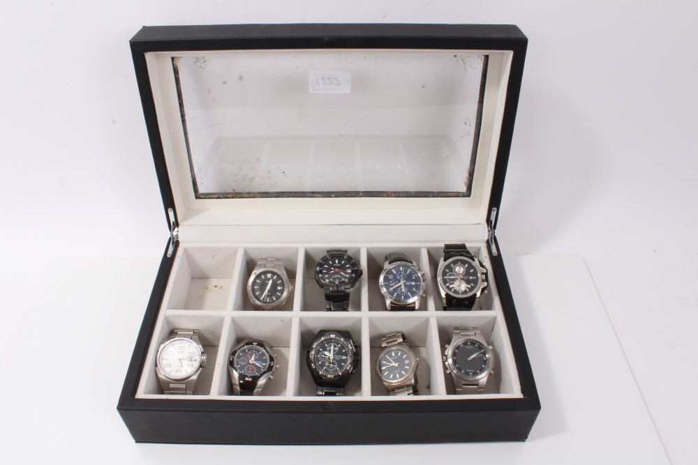 Collection of nine various Pulsar wristwatches within a black leather watch display case