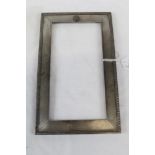Edwardian silver photograph frame of vertical rectangular form,