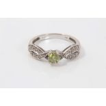 White gold (18ct) peridot and diamond ring. Size M½ CONDITION REPORT Weight 3.