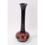 Moorcroft Pomegranate pattern bottle vase with tall slender neck and flared rim - blue signature