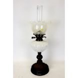 Victorian brass oil lamp with milk glass reservoir and vaseline glass shade,