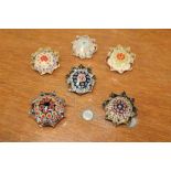 Six small Strathearn Star paperweights with millefiori decoration