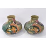 Pair Moorcroft Coy Carp pattern ovoid vases with tube-lined decoration on green ground - monogram