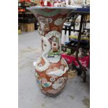 Late 19th century Japanese porcelain floor vase with moulded coiled dragon and painted Samurai and