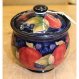 Moorcroft Pomegranate pattern jar and cover on blue ground - green signature and impressed marks,