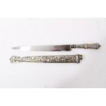 South American Gaucho hunting knife with ornate white metal grip with foliate decoration and steel