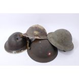 Group of four Second World War British Military MKII Steel Helmets including one with North