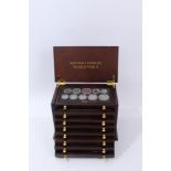 G.B. a teak eight-drawer cabinet containing ‘British Coins of World War II’ 1939 – 1945, with