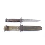 Second World War American M3 Fighting Knife with ribbed wooden grip and steel blade stamped 'US M3